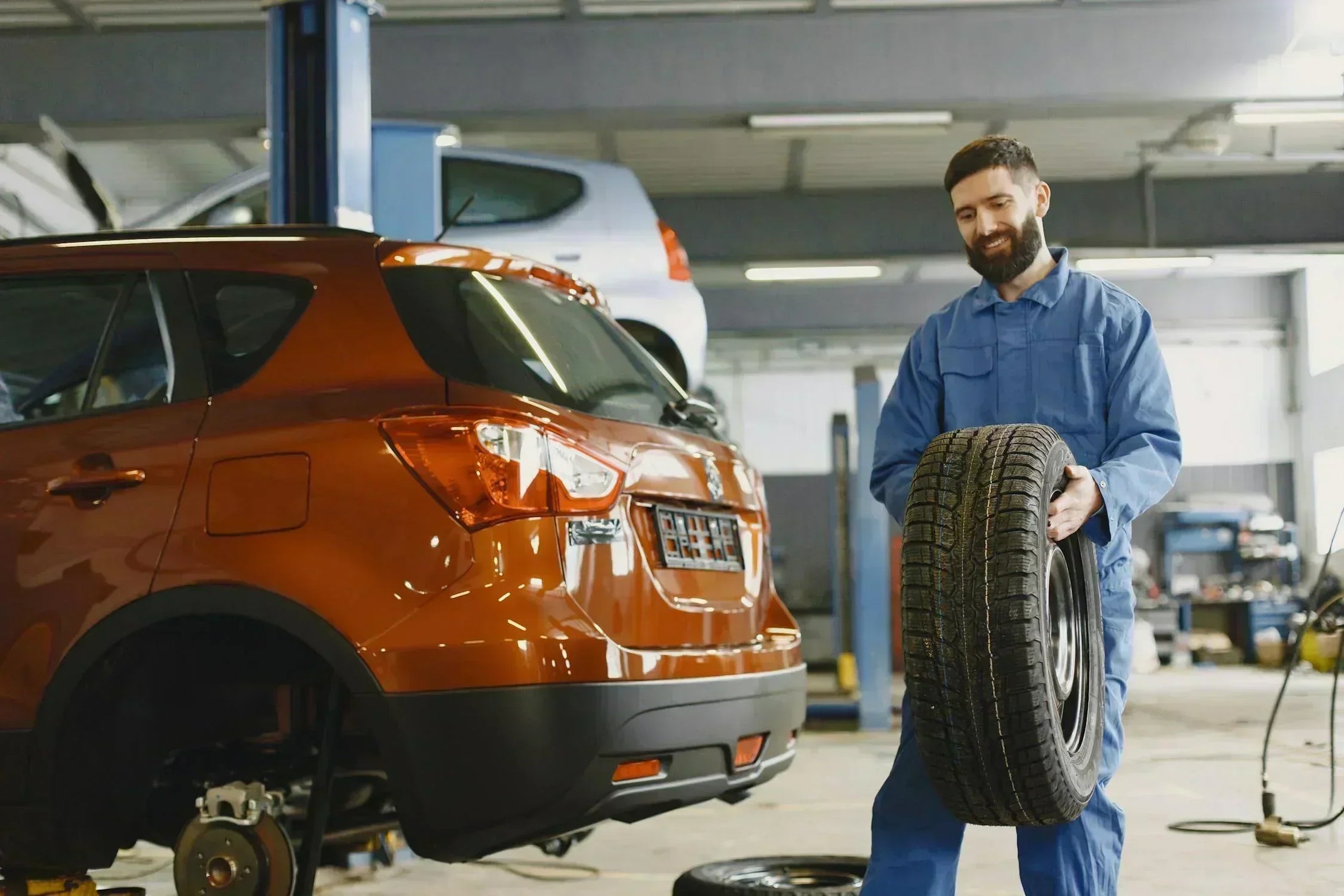 Tire shop bay, generic stock image for a regulatory compliance post about brake cleaner VOC rules